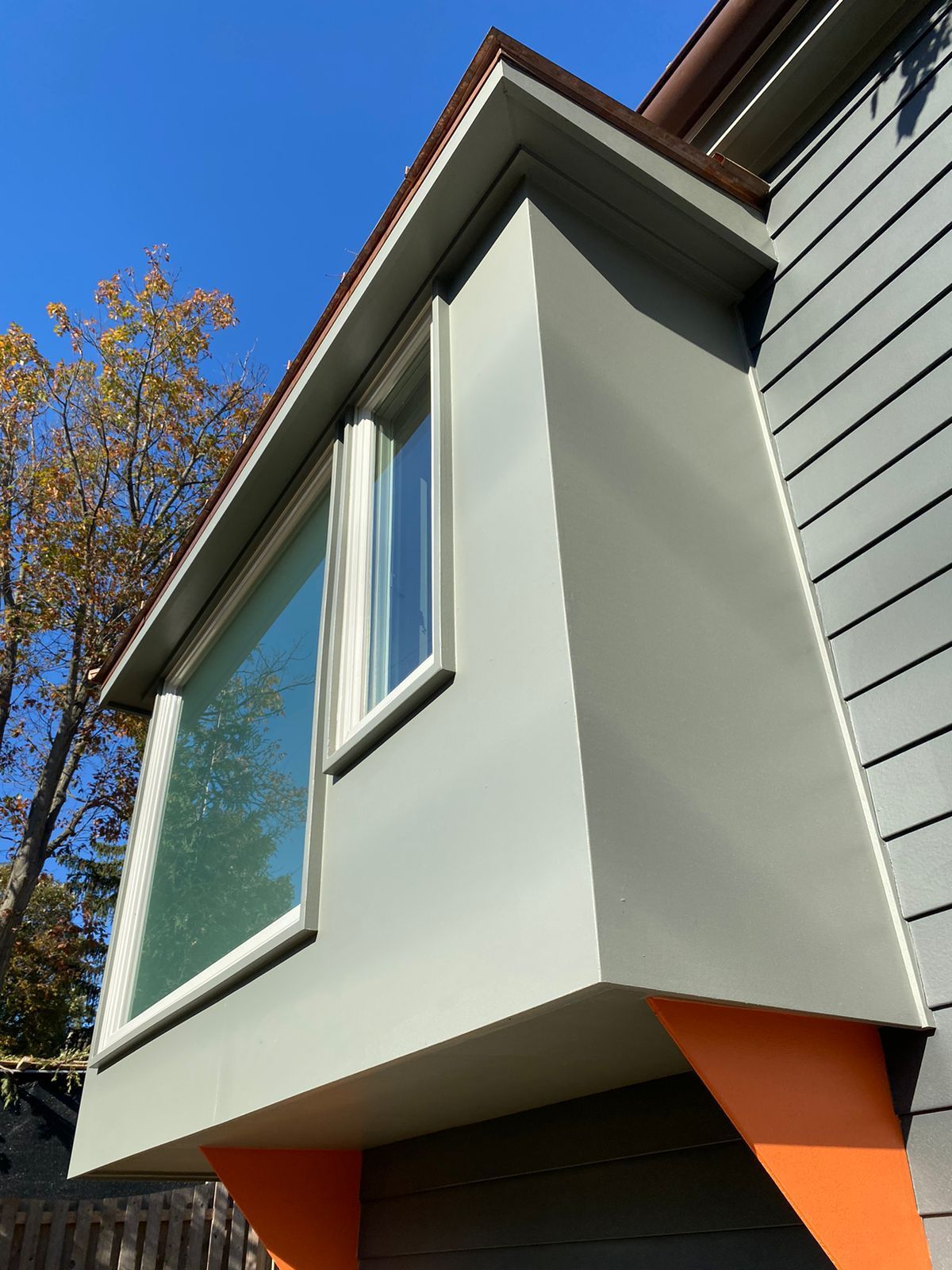 A house with a window on the side of it .James McCoy Remodeling Services Serving 19072,19003,19118,19444,19095 and surrounding areas